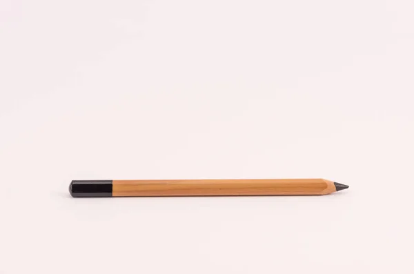 Closeup Wooden Black Pencil Light Pink Empty Surface — Stock Photo, Image