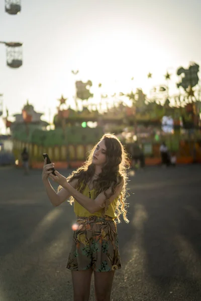 Positive Young Female Standing Ferris Wheel Amusement Park Doing Selfie — Stock Photo, Image
