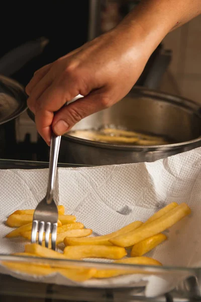 Vertical Shot Hand Putting Golden Crispy French Fries Napkin — Stock Photo, Image