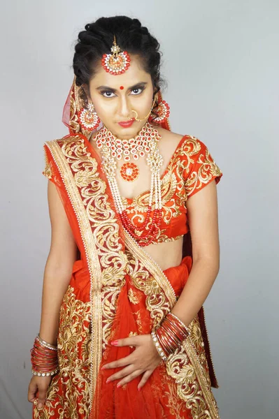 Beautiful Indian Woman Traditional Red Sari Dress Posing White Wall — стоковое фото