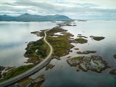 The Atlantic Ocean Road is located in the midwest part of the Norwegian coastline. It's the world's best road trip according to The Guardian. clipart