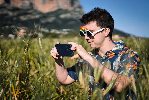 Young Hispanic Male Taking Closeup Selfie Mobile Phone Field — Stock Photo, Image