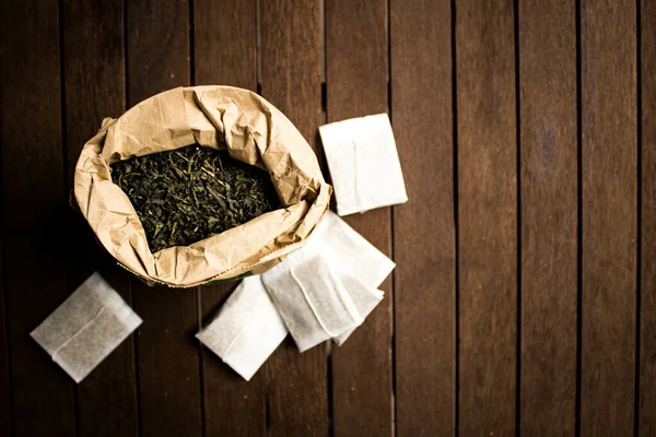 Top View Big Little Bags Dried Herbal Tea Wooden Table — Stock Photo, Image