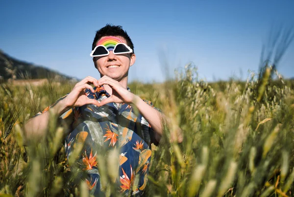 Young Hispanic Male Showing Heart Love Sign His Hands Field — Stock Photo, Image