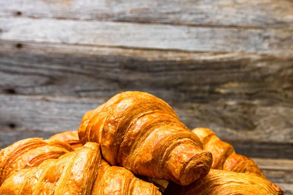 Closeupshot Newly Baked Croissants Isolated Wooden Background — Stock Photo, Image