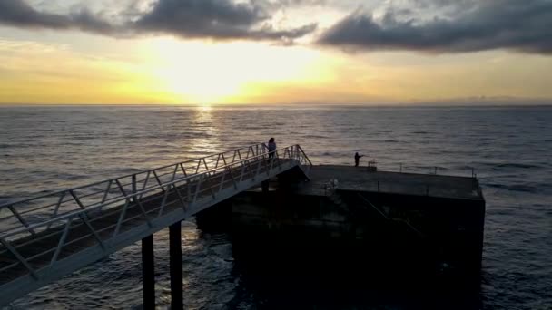 Aerial Footage Woman Stone Pier Tranquil Sea Beautiful Sunset — Αρχείο Βίντεο