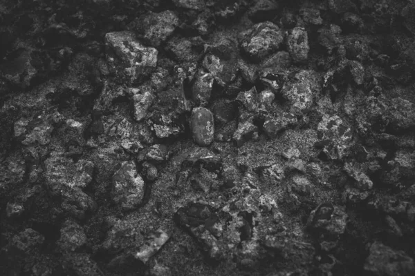 黑色岩石结构背景的闭合 灰色的粗糙石材质感和设计背景 用石头做的黑色抽象背景 — 图库照片