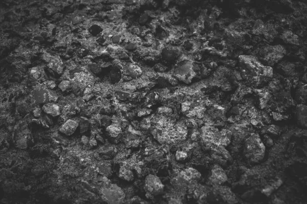 黑色岩石结构背景的闭合 灰色的粗糙石材质感和设计背景 用石头做的黑色抽象背景 — 图库照片