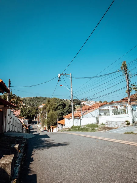 Vertical Shot Asphalt Road Residential Buildings Blue Sky Electric Lines — Stock Fotó