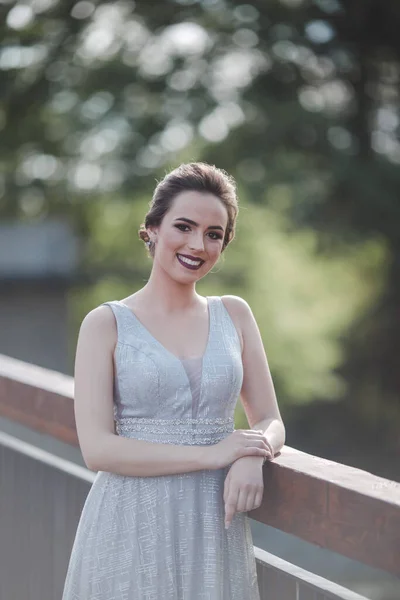 Portrait Brunette Caucasian Woman Wearing Long Gray Dress Leaning Fences — Stock Photo, Image