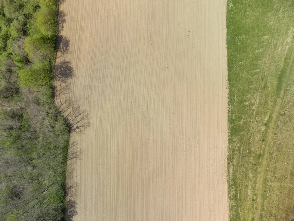 Een Luchtfoto Van Nieuw Geharrogeerd Bruin Land Bij Zonsondergang — Stockfoto