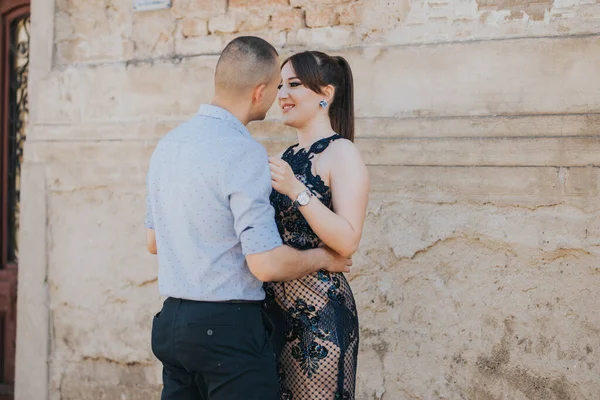 Beautiful Elegantly Dressed Couple Hugging Brick Wall Outdoor — 스톡 사진