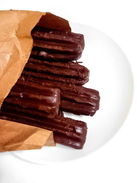 Churros Covered Chocolate Out Paper Bag Traditional Argentine Fried Tough — стоковое фото