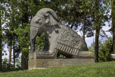 LUTON, UNITED KINGDOM - Jun 06, 2021: An Indian elephant sculpture at ZSL Whipsnade Zoo. clipart