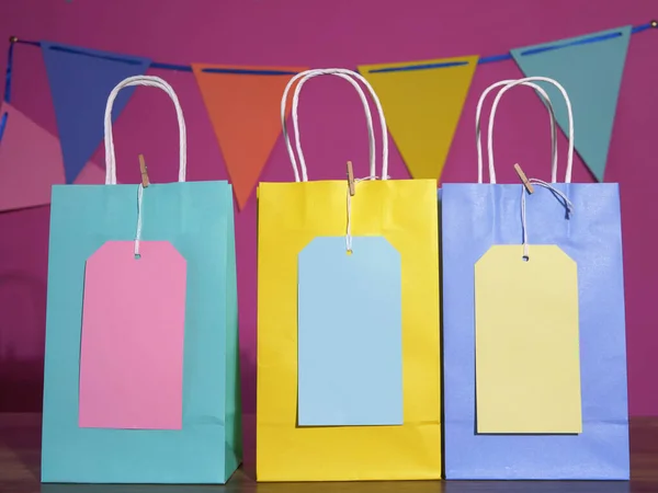 Gift Bags Labels Bunting Background Medium Shot — Stockfoto