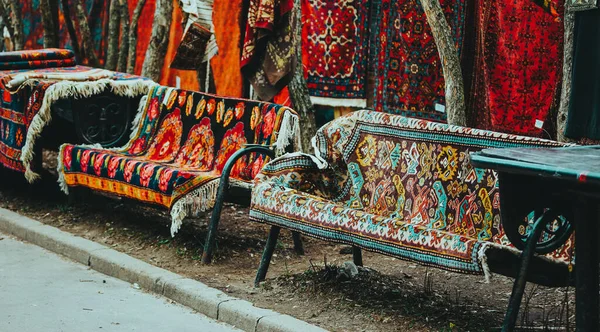 Closeup Shot Benches Covered Traditional Patterned Fabrics — Stock Photo, Image