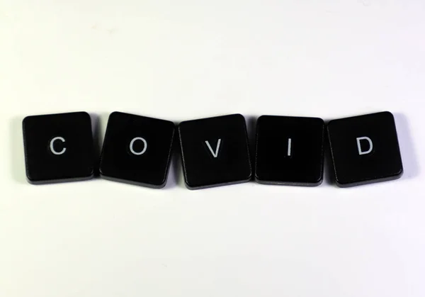 Detailní Záběr Slova Covid Počítačových Klíčů — Stock fotografie