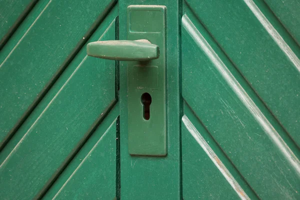Eine Nahaufnahme Einer Türklinke Mit Einem Schlüsselloch Darunter Einem Grünen — Stockfoto