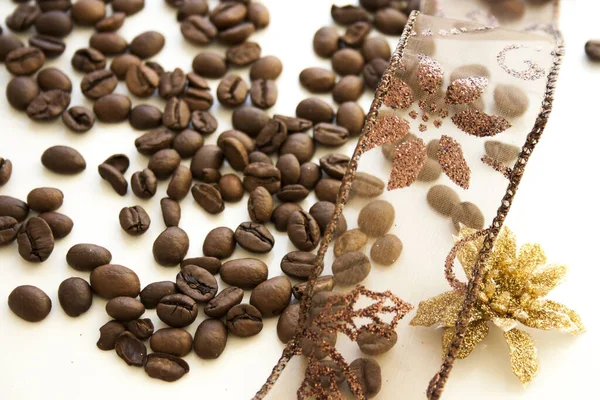 Closeup Lace Ribbon Roasted Coffee Beans White Surface — Zdjęcie stockowe