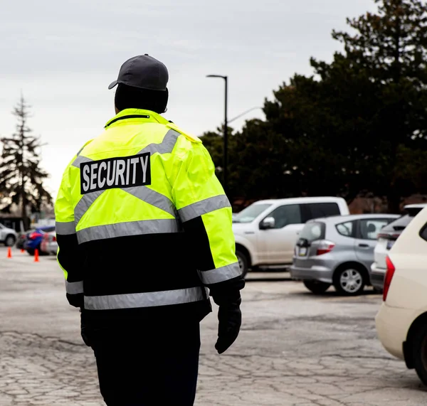 Rear View Security Guard Watching Parking Area — Stock Fotó