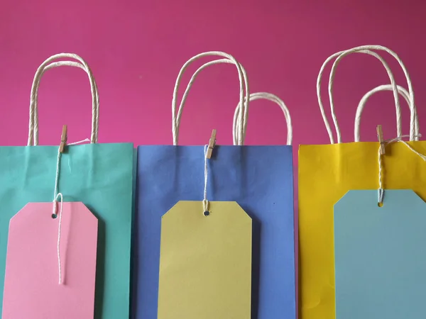 Gift Bags Labels Pink Background Medium Shot — Stockfoto