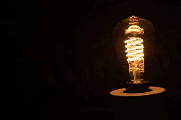 Closeup Vintage Lightbulb Orange Spiral Light Mysterious Dark Room — Zdjęcie stockowe