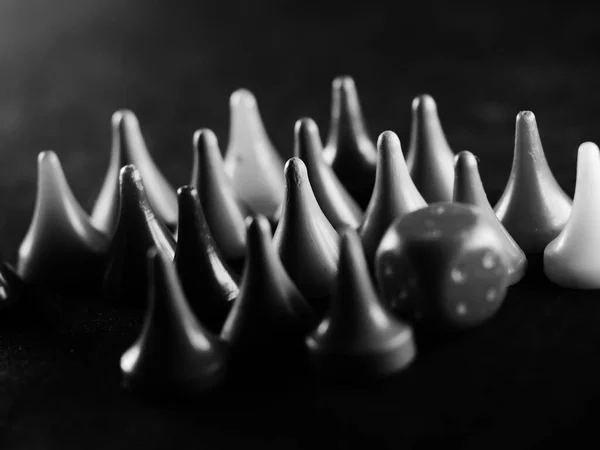 Grayscale Shot Triangular Board Game Pieces Dice Table Bright Lighting — Stockfoto