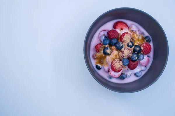 Top View Yogurt Raspberries Blueberries Powder Bowl Isolated Blue Background — Stock Photo, Image