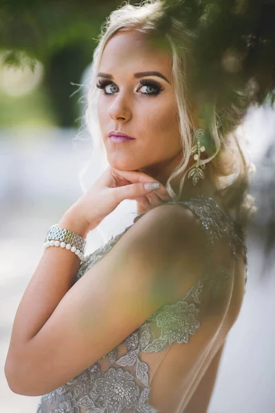 Pretty Blonde Caucasian Woman Silver Evening Dress Posing Outdoors — стоковое фото
