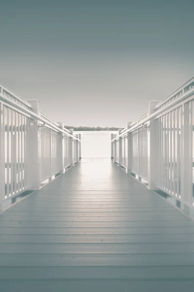 Dramatic Shot White Wooden Jetty Walk Leading Sea Clear Sky — Stock Photo, Image