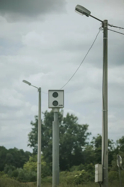 Vertical Shot Speed Camera Street Lights Rural Road Cloudy Day — Fotografia de Stock