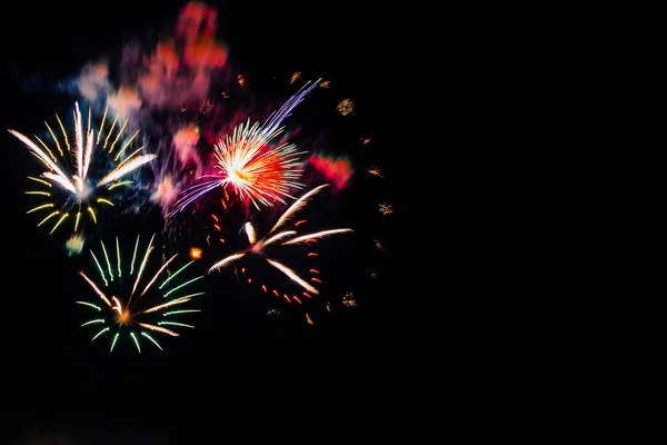 Dark Sky Colorful Firework Blast Stock Picture