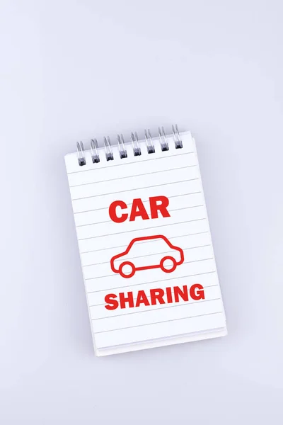 Vertical Shot Notepad Text Car Sharing Isolated White Background — Stockfoto