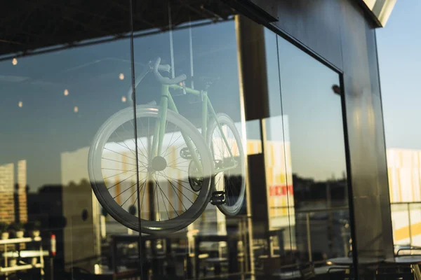 Closeup Bicycle Displayed Seen Glass Wall Commercial Building - Stock-foto