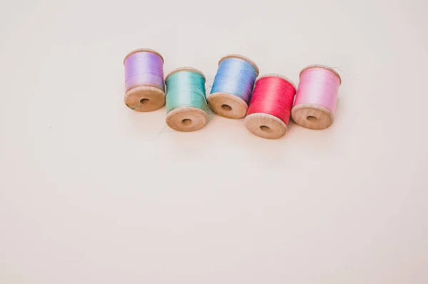 Colorful Sewing Threads Light Background Free Space Text — 스톡 사진