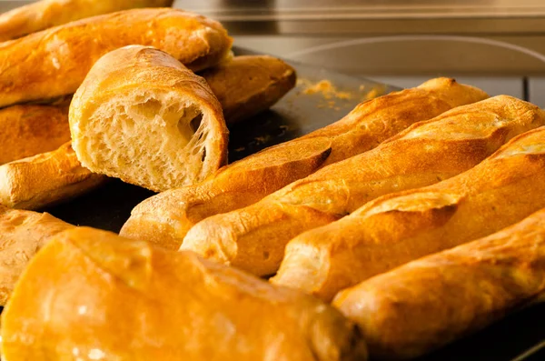 Closeup Shot Freshly Baked French Baguette Loaves Bread Kitchen Table — Stock Fotó