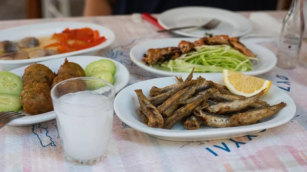 Ouzeri fish tavern , tsipouro restaurant in Volos, Greece. Taverns, bulk tsipouro good appetizers, Seafood . fish , go to Volos for tsipouro.