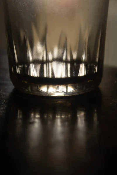 Vertical Shot Almost Empty Glass Water Table Indoors — Stock Photo, Image