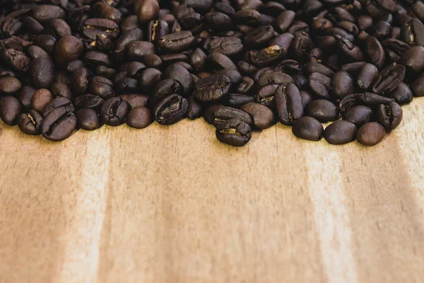 Pile Coffee Beans Wooden Background — Stock Photo, Image