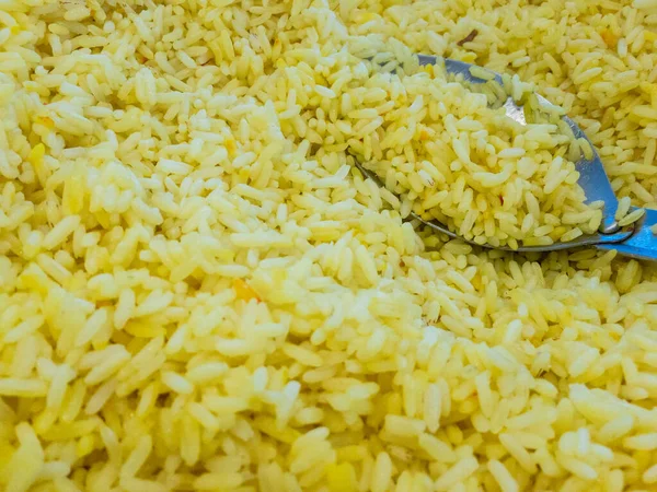 Una Porción Arroz Amarillo Con Una Cuchara —  Fotos de Stock