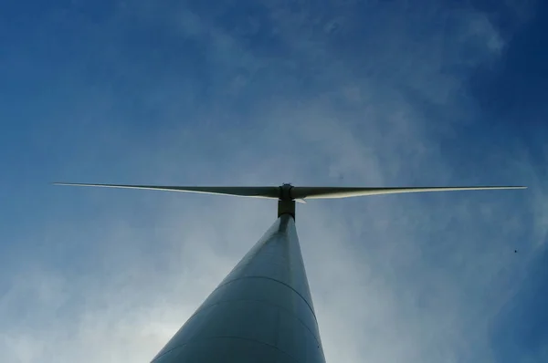 Clouds Surround Silhouette Wind Turbine Blue Sky — Stock Photo, Image