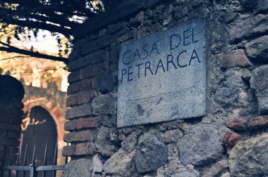 the entrance of poet Francesco Petrarca  house museum in arqua' petrarca, italy clipart