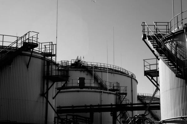 Grayscale Shot Multiple Factory Buildings Clear Bright Sky Staircases Them — Stock Photo, Image