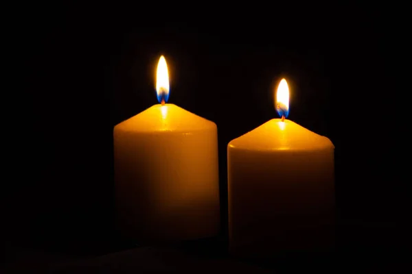 Closeup Shot Two Candles Flame Isolated Dark Background Emotional Concept — Stock Photo, Image