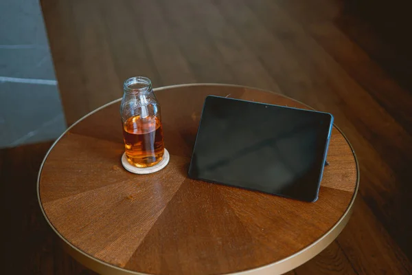 Top View Black Tablet Blank Screen Wooden Table Teapot Side — Stock Photo, Image