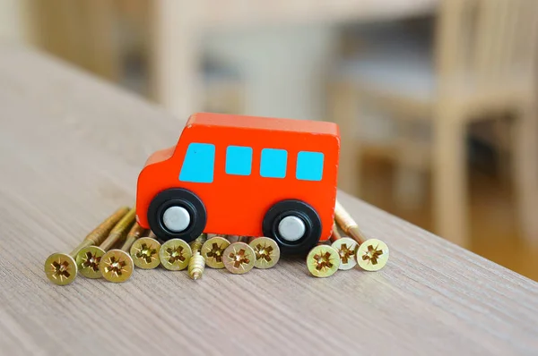 Closeup Red Painted Wooden Car Toy Metal Screws — Stock Photo, Image