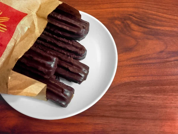 Churros Borított Csokoládé Papírzacskó Hagyományos Argentin Sült Tészta Tészta Spanyol — Stock Fotó