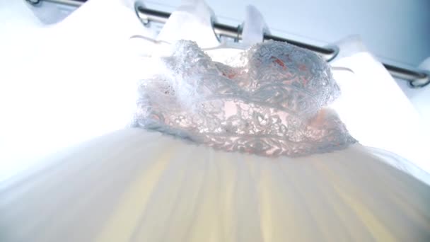 Low Angle Shot Bridal Wedding Gown Hanging Curtain Rod — Stock Video