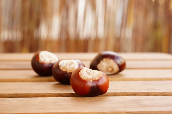 Closeup Shot Fresh Chestnuts Wooden Surface — Stock Photo, Image