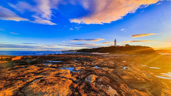 Closeup Shot Coastline Lighthouse Background Sunset — Stock Photo, Image